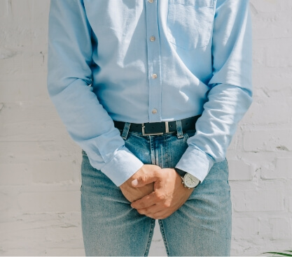 cropped-view-of-man-holding-clenched-hands-near-gr-2023-11-27-05-15-44-utc (1)